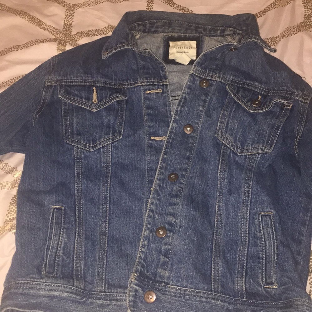Forever 21 blue denim jacket with black lace back.